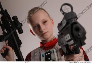 DENISA WITH TWO GUNS